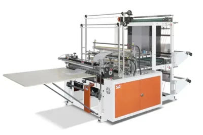 Automated packaging machine with conveyor and cutting features.