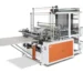 Automated packaging machine with conveyor and cutting features.